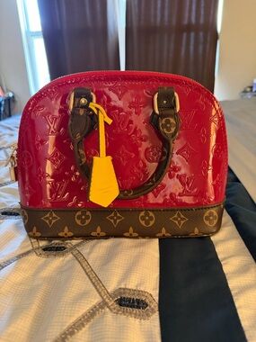 Fashion Nova Red Satchel with Brown Monogram Trim and Yellow Tag